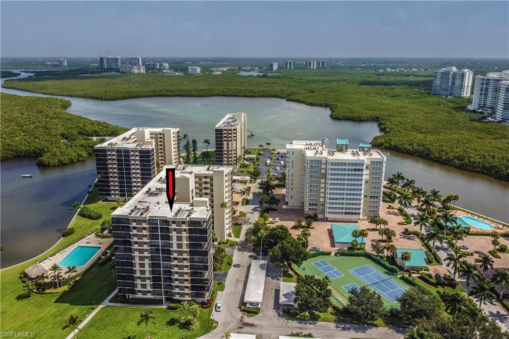 11 Bluebill Avenue, Unit 1101 Naples, FL 34108 - Photo 5 of 40 an aerial view of a city with garden