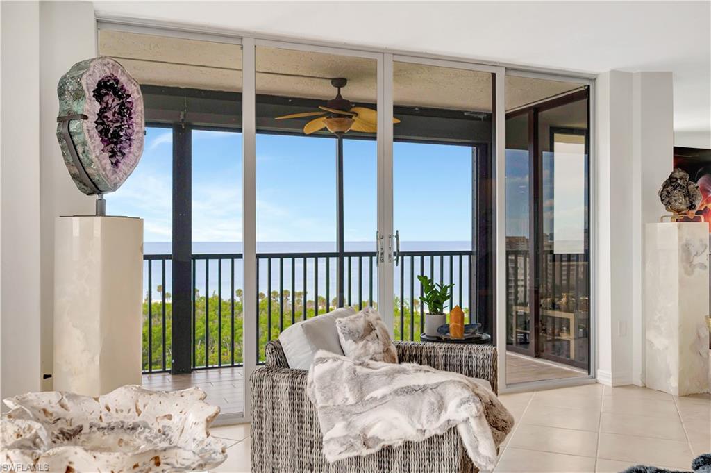 11 Bluebill Avenue, Unit 1101 Naples, FL 34108 - Photo 9 of 40 a view of a balcony with wooden floor