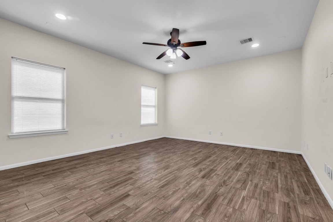 25171 Virginia Lane Porter, TX 77365 - Photo 24 of 39 wooden floor in an empty room with a window