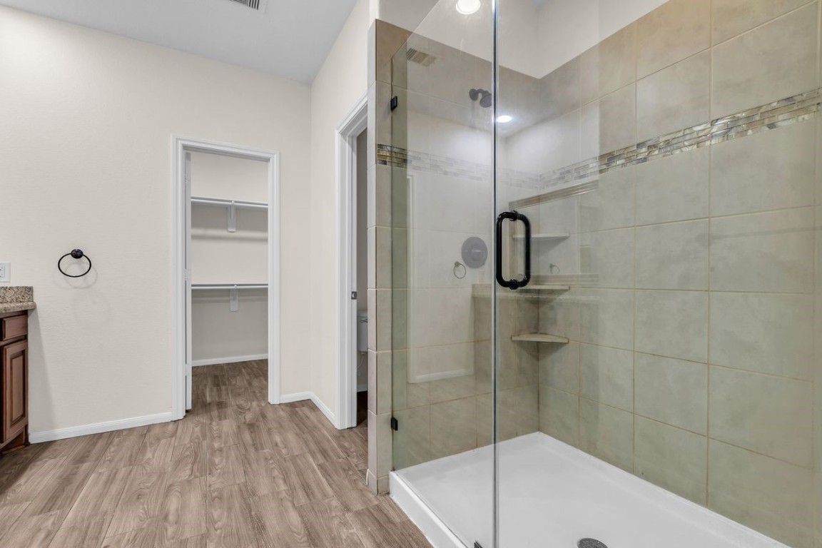 25171 Virginia Lane Porter, TX 77365 - Photo 25 of 39 a bathroom with a shower and a sink