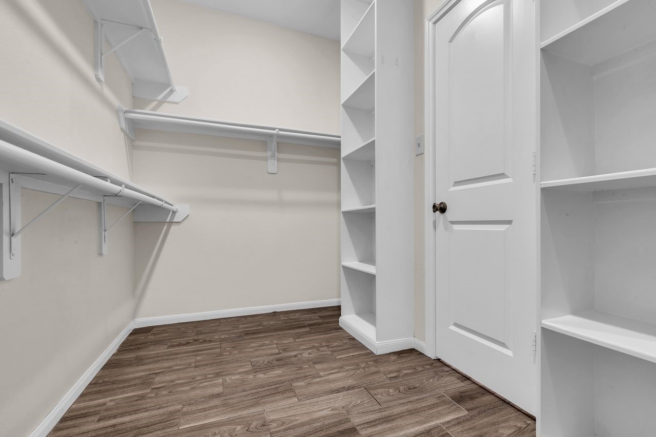 25171 Virginia Lane Porter, TX 77365 - Photo 27 of 39 a view of an empty walk in closet