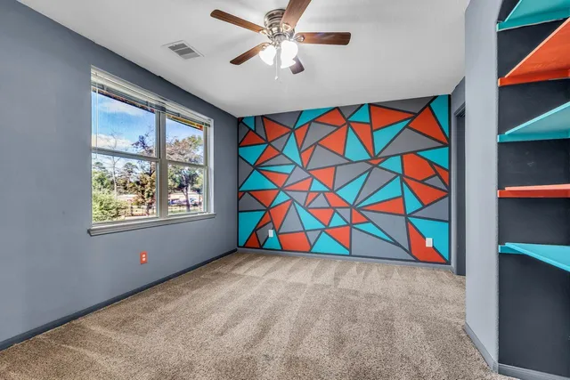 a room with lots of multi story white walls