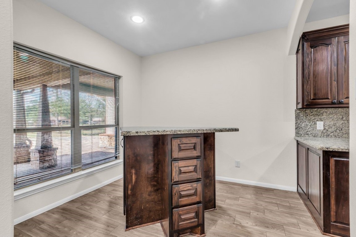 25171 Virginia Lane Porter, TX 77365 - Photo 9 of 39 a view of cabinets and a wooden floor