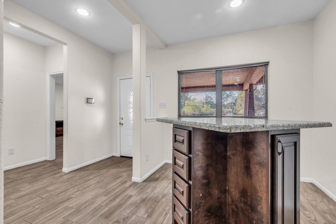 25171 Virginia Lane Porter, TX 77365 - Photo 10 of 39 a living room with a wooden floor and large window