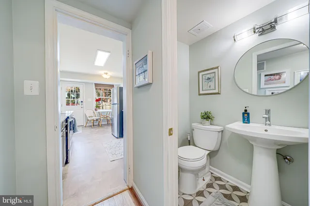 a kitchen with stainless steel appliances granite countertop a refrigerator stove microwave and sink