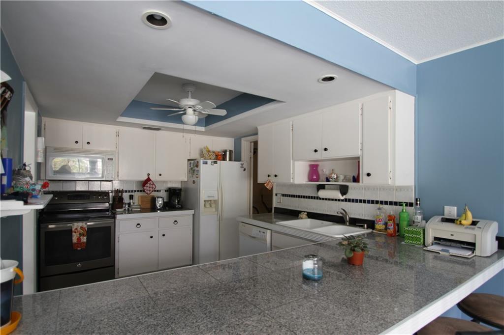 1153 Northwest Spruce Ridge Drive Stuart, FL 34994 - Photo 15 of 22 Gallery Image 15