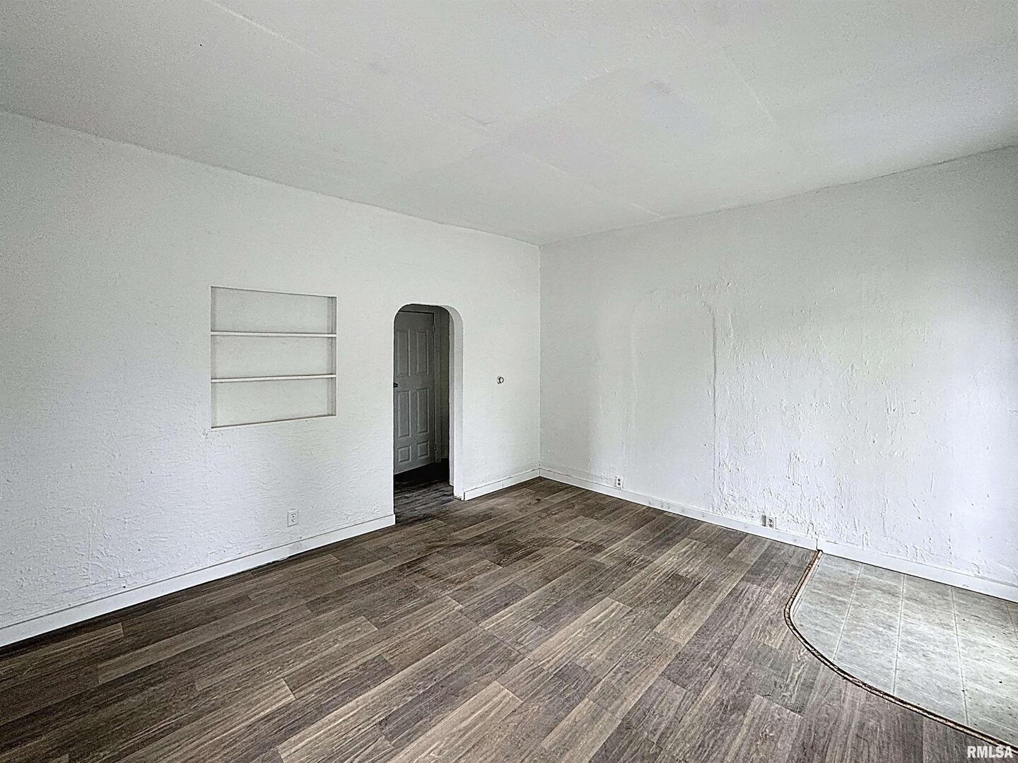 204 Main Avenue Matherville, IL 61263 - Photo 9 of 27 a view of empty room with wooden floor