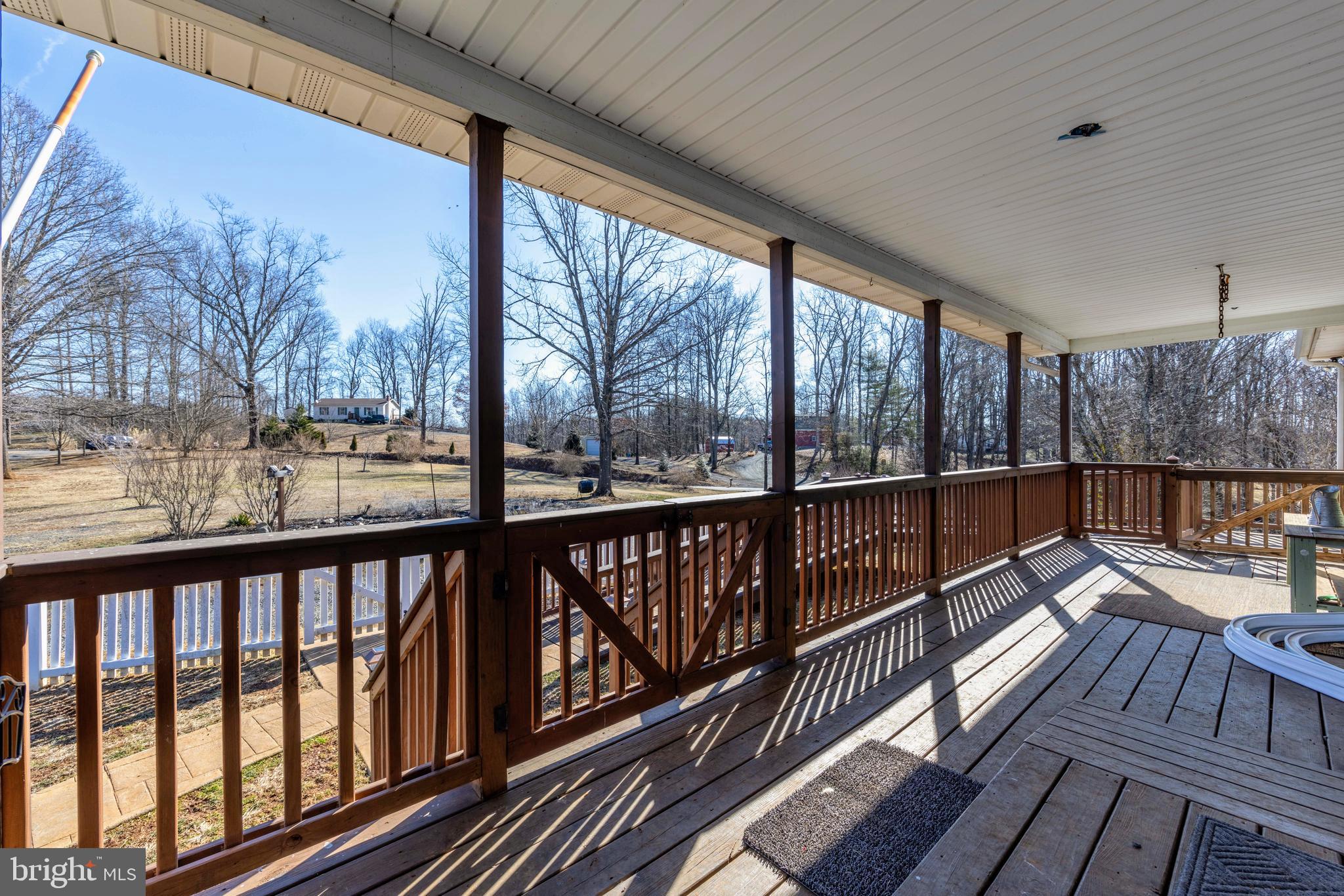 3277 Cabin Road Reva, VA 22735 - Photo 4 of 53 a view of balcony with wooden floor