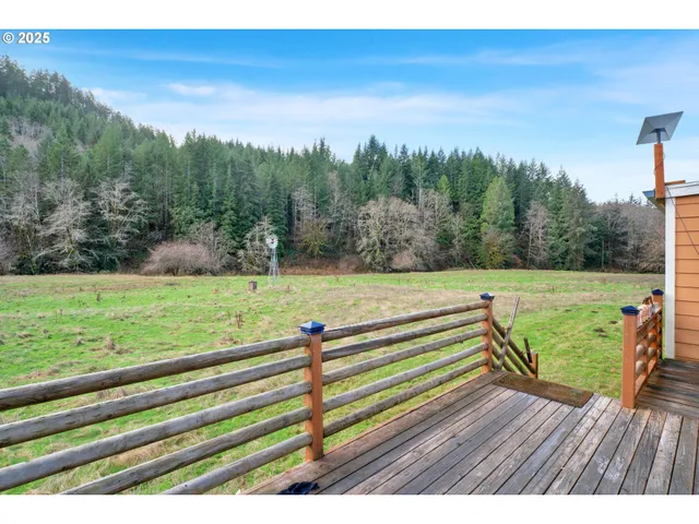 a backyard of a house with lots of green space