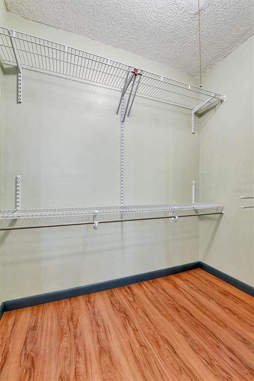 558 Capistrano Court Largo, FL 33771 - Photo 21 of 40 a view of a room with wooden floor