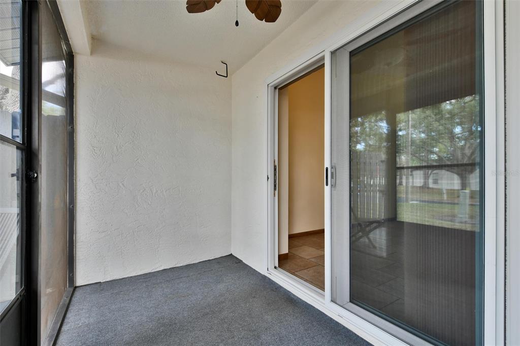 558 Capistrano Court Largo, FL 33771 - Photo 30 of 40 a view of a glass door with a glass door