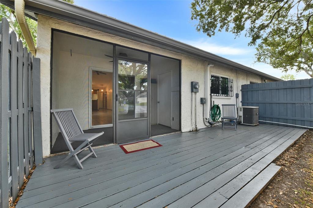 558 Capistrano Court Largo, FL 33771 - Photo 31 of 40 a view of a two chairs in the balcony