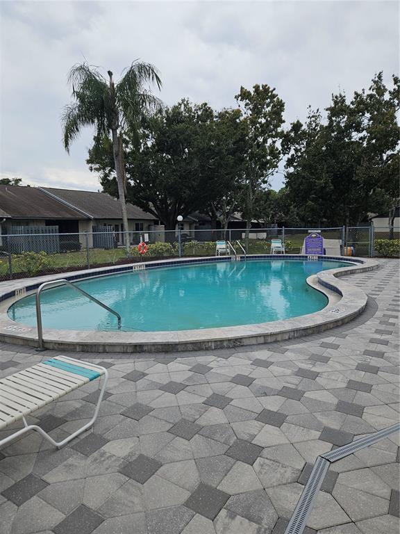 558 Capistrano Court Largo, FL 33771 - Photo 40 of 40 a view of outdoor space yard and swimming pool