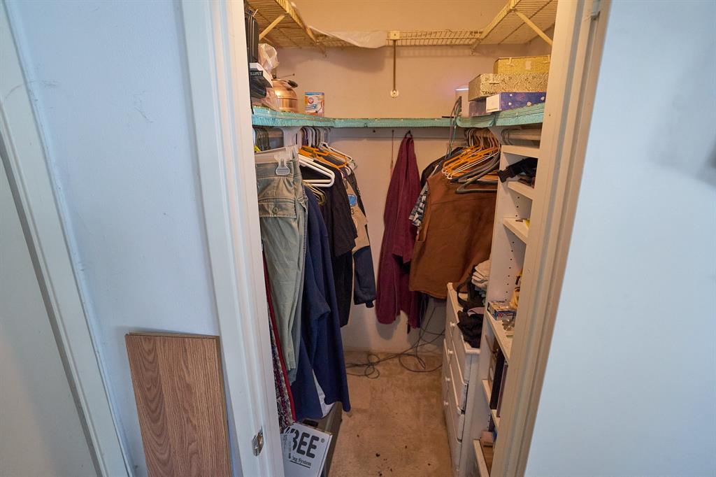 651 Pine Drive, Unit 201 Pompano Beach, FL 33060 - Photo 17 of 18 a view of walk in closet with clothes and shoes