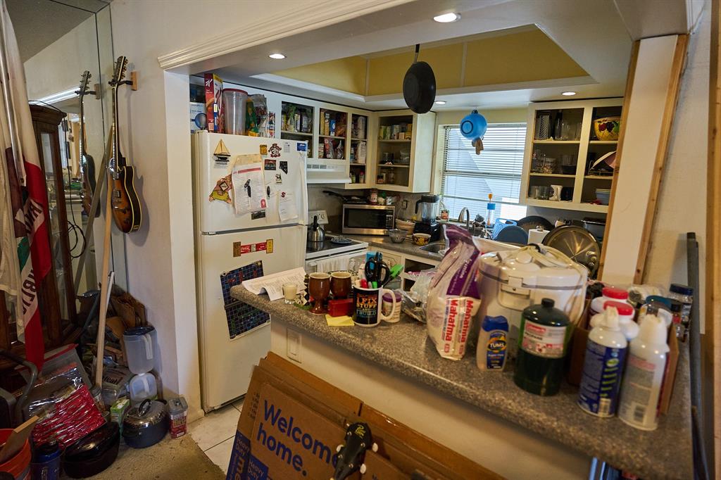 651 Pine Drive, Unit 201 Pompano Beach, FL 33060 - Photo 9 of 18 a view of a room with gym equipment