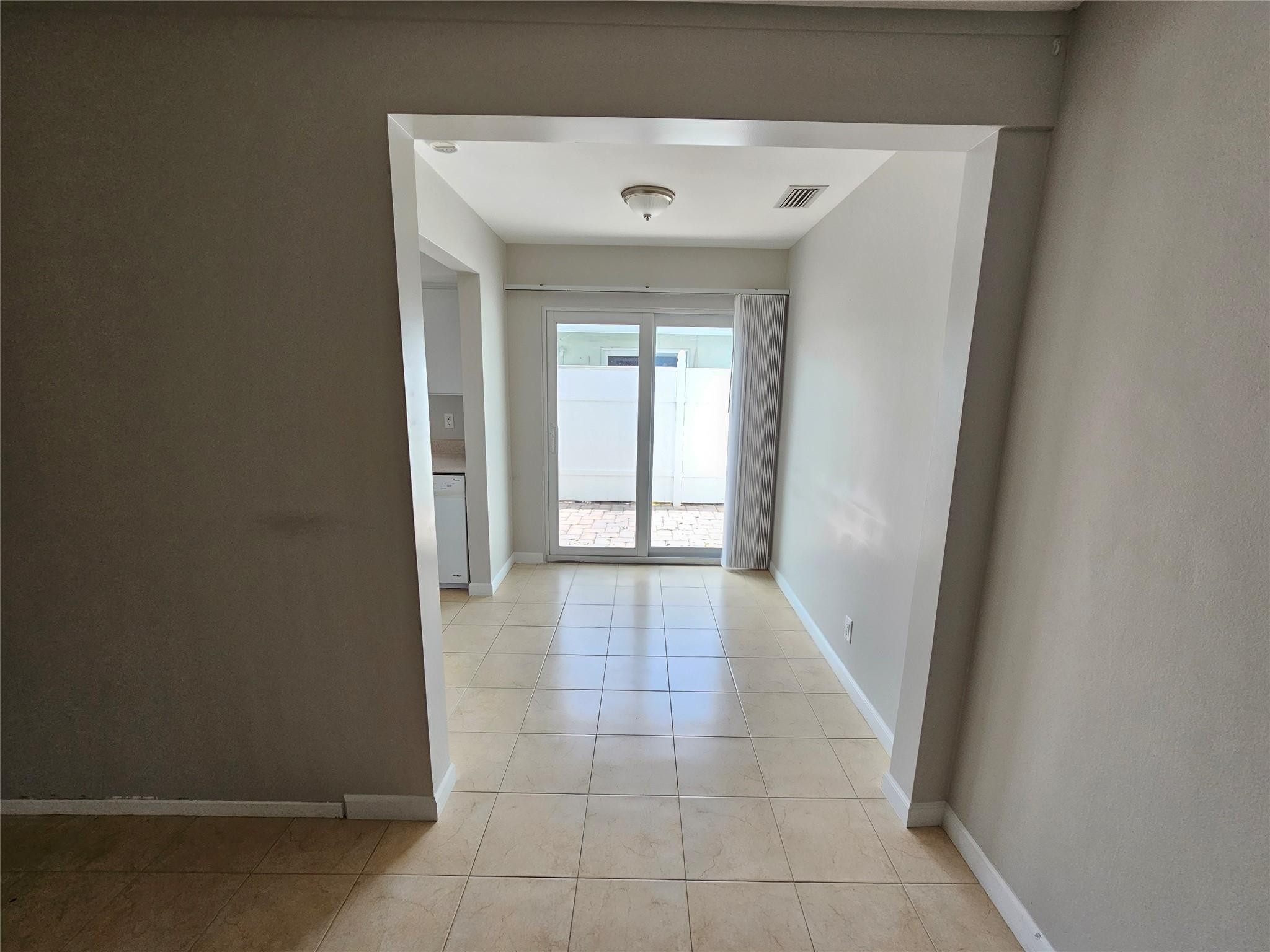 2120 Northeast 41st Street, Unit B Lighthouse Point, FL 33064 - Photo 20 of 24 a view of a hallway