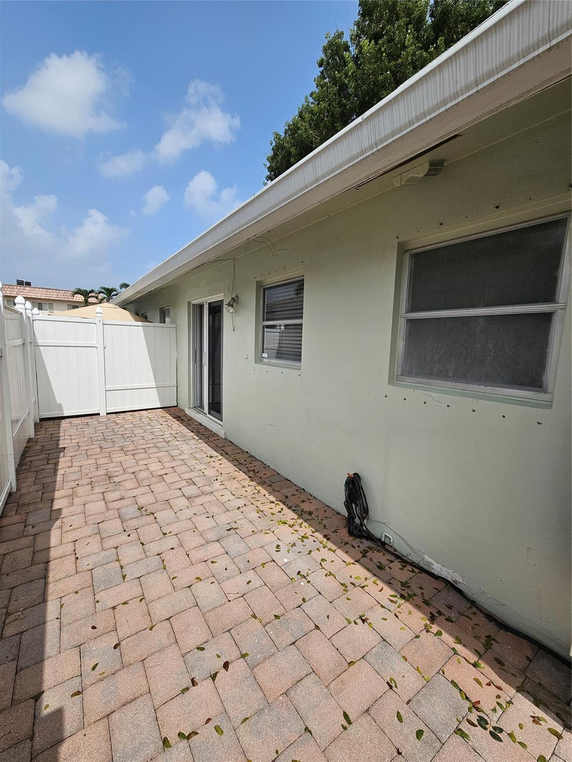 2120 Northeast 41st Street, Unit B Lighthouse Point, FL 33064 - Photo 24 of 24 a view of a house with a yard