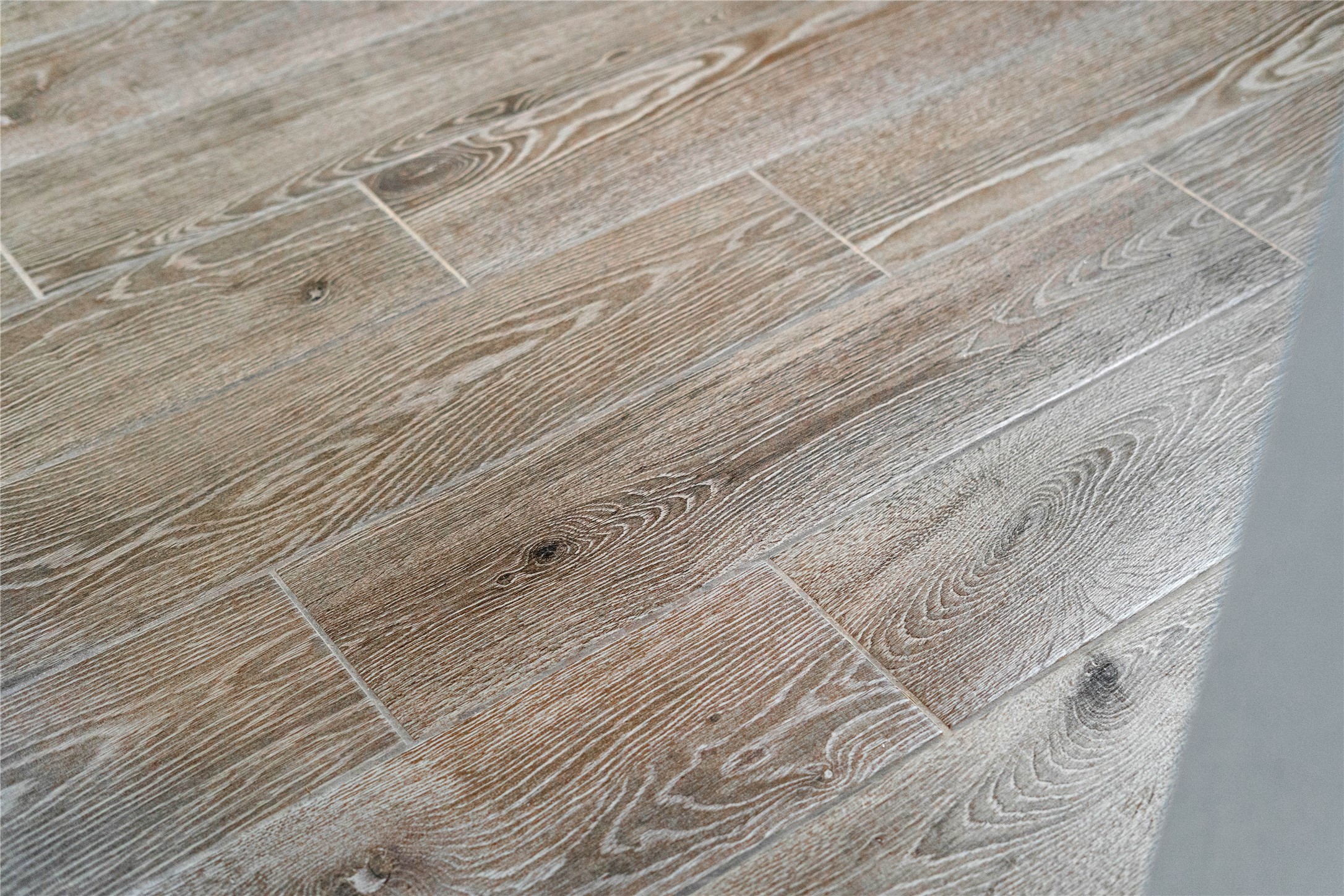 19657 Montgomery Rdg Way Montgomery, TX 77316 - Photo 7 of 49 Wood-look tile flooring - Mercato Grey.