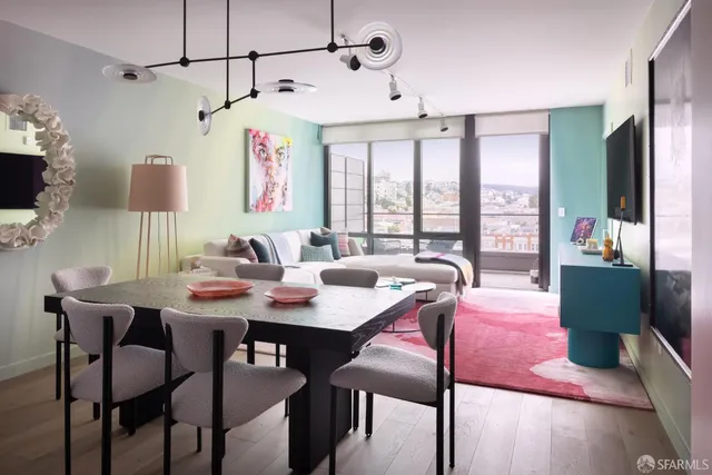 a view of a dining room with furniture window and outside view