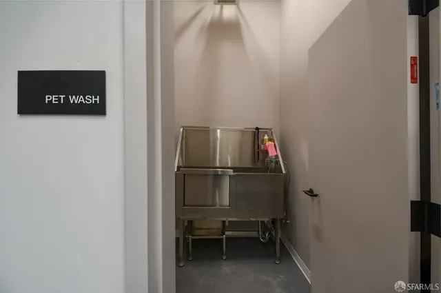a view of a chairs and table in a patio