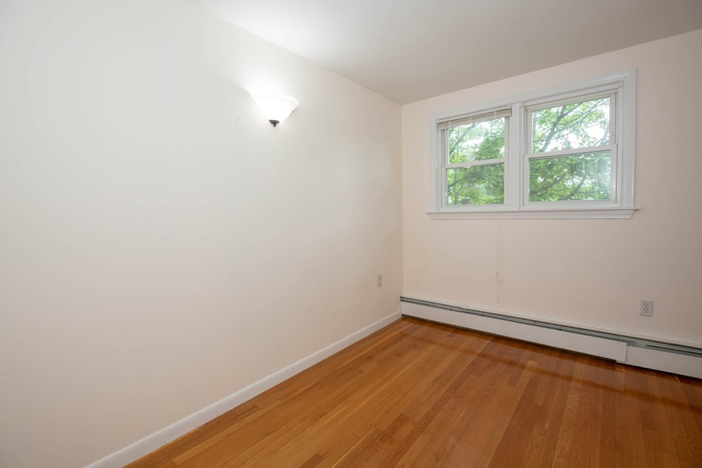 28 Charles Road, Unit 28 Winchester, MA 01890 - Photo 17 of 28 an empty room with a window
