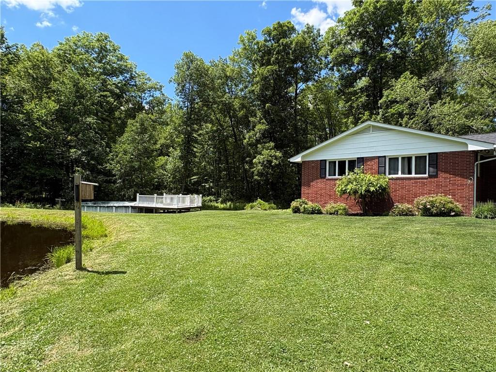 320 Cherry Hill Road Greenville, PA 16125 - Photo 29 of 38 a view of a house with a yard and sitting area