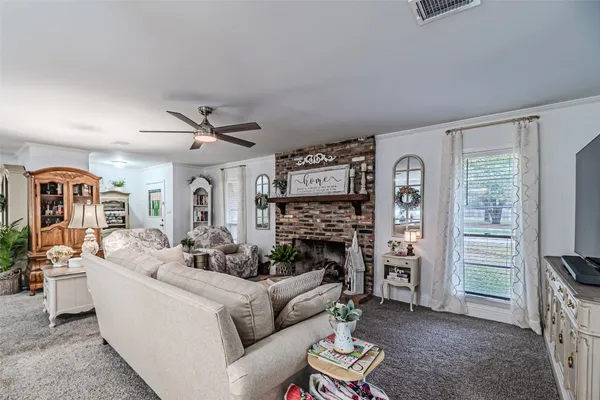 a kitchen with a refrigerator and a sink