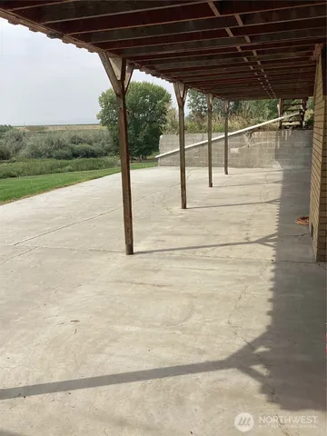 a view of a back yard from a big room