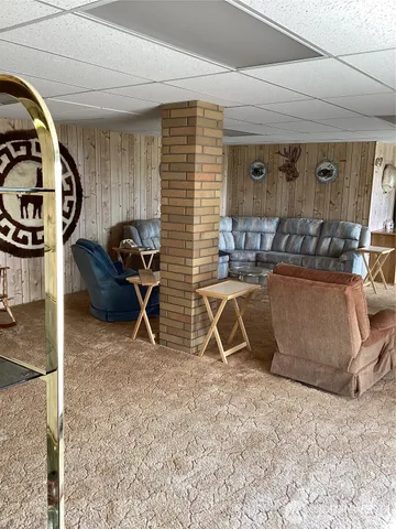 a room with furniture and a wooden floor