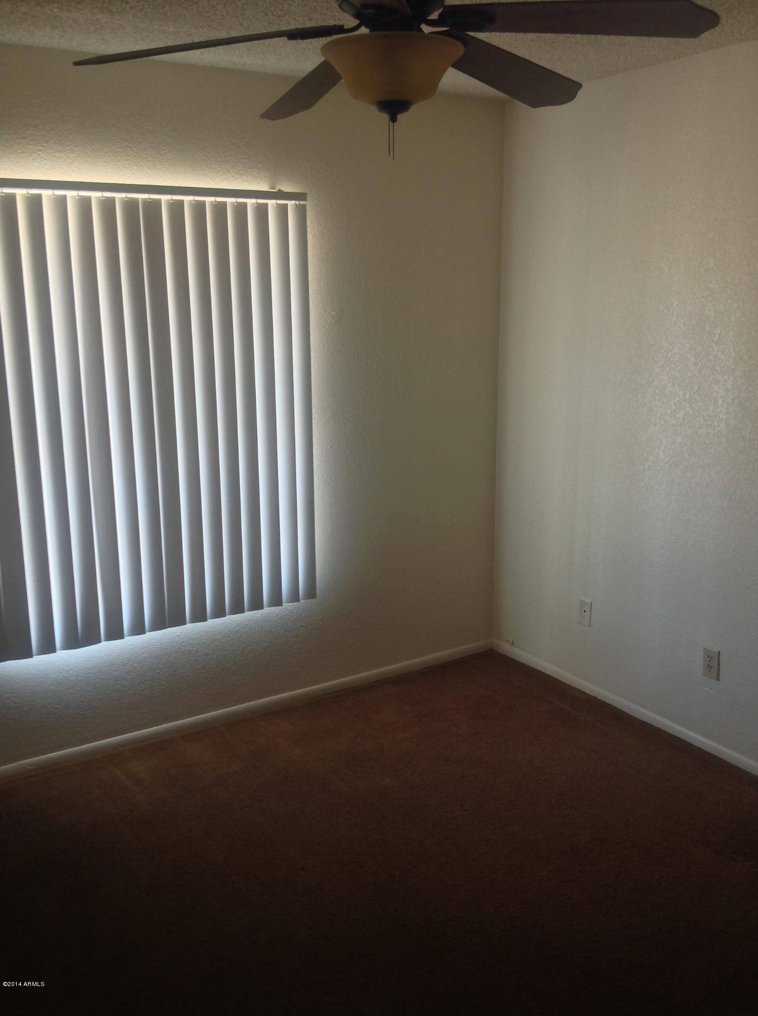 3819 West Calavar Road Phoenix, AZ 85053 - Photo 17 of 26 BR2 - 10 X 10 - HAS MIRRORED CLOSET DOOR