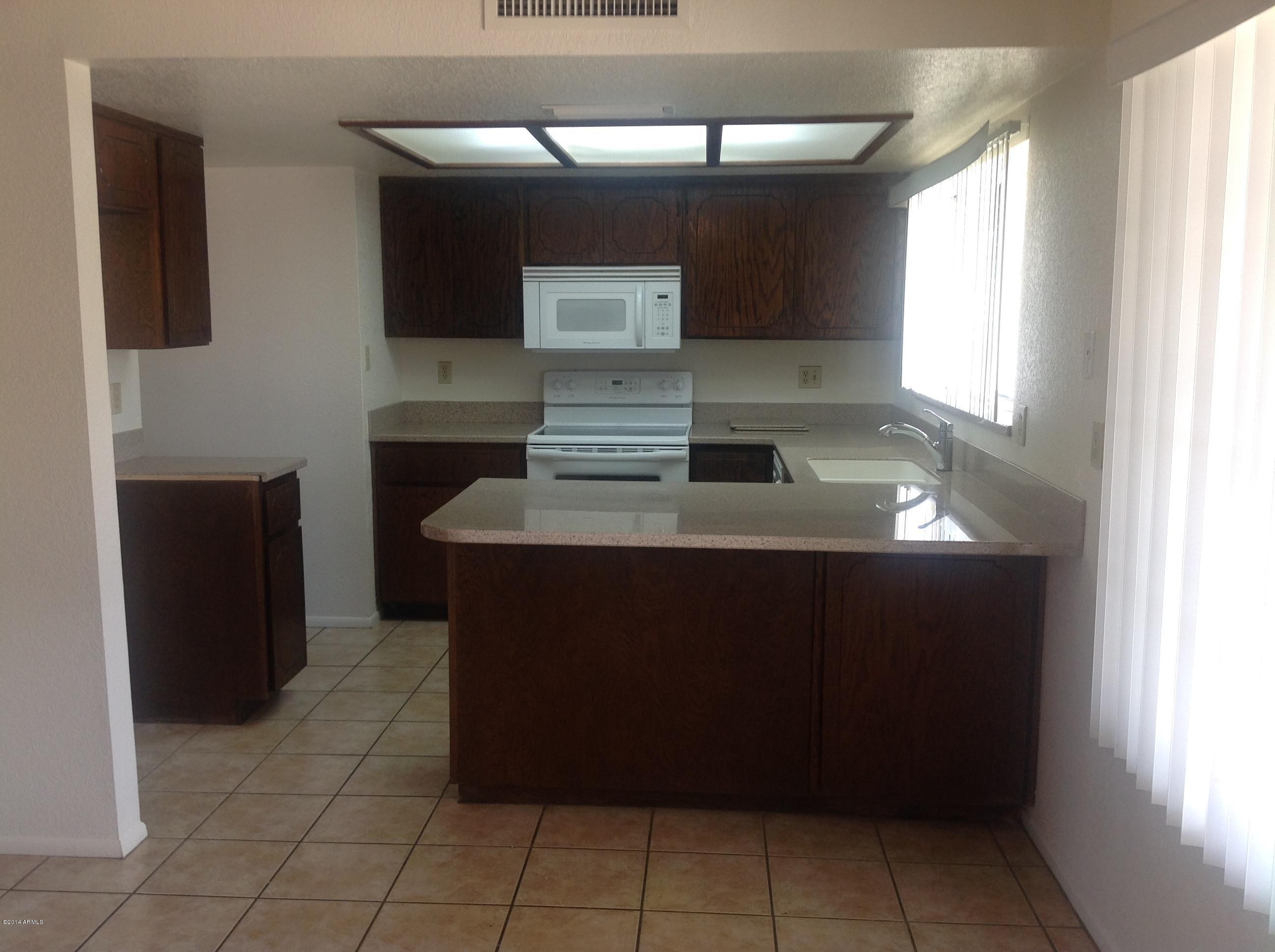 3819 West Calavar Road Phoenix, AZ 85053 - Photo 6 of 26 IMG_6949