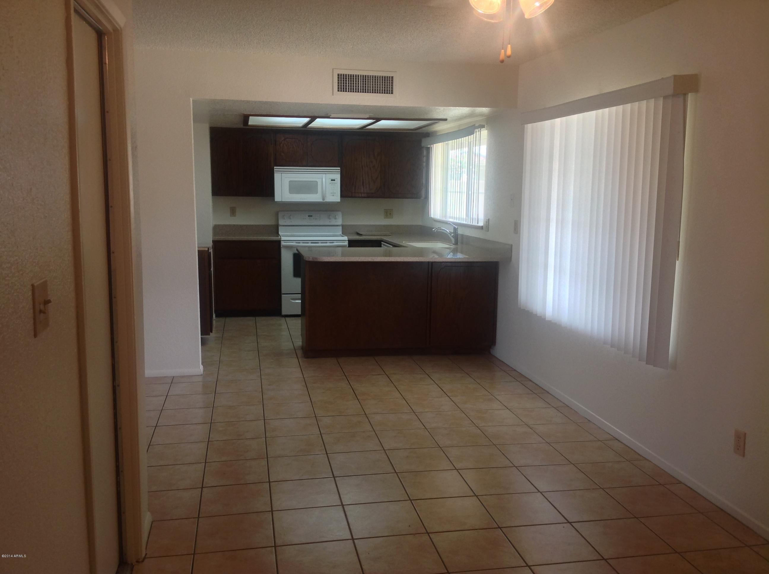 3819 West Calavar Road Phoenix, AZ 85053 - Photo 7 of 26 IMG_6970