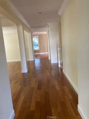 wooden floor in a hall with an entryway
