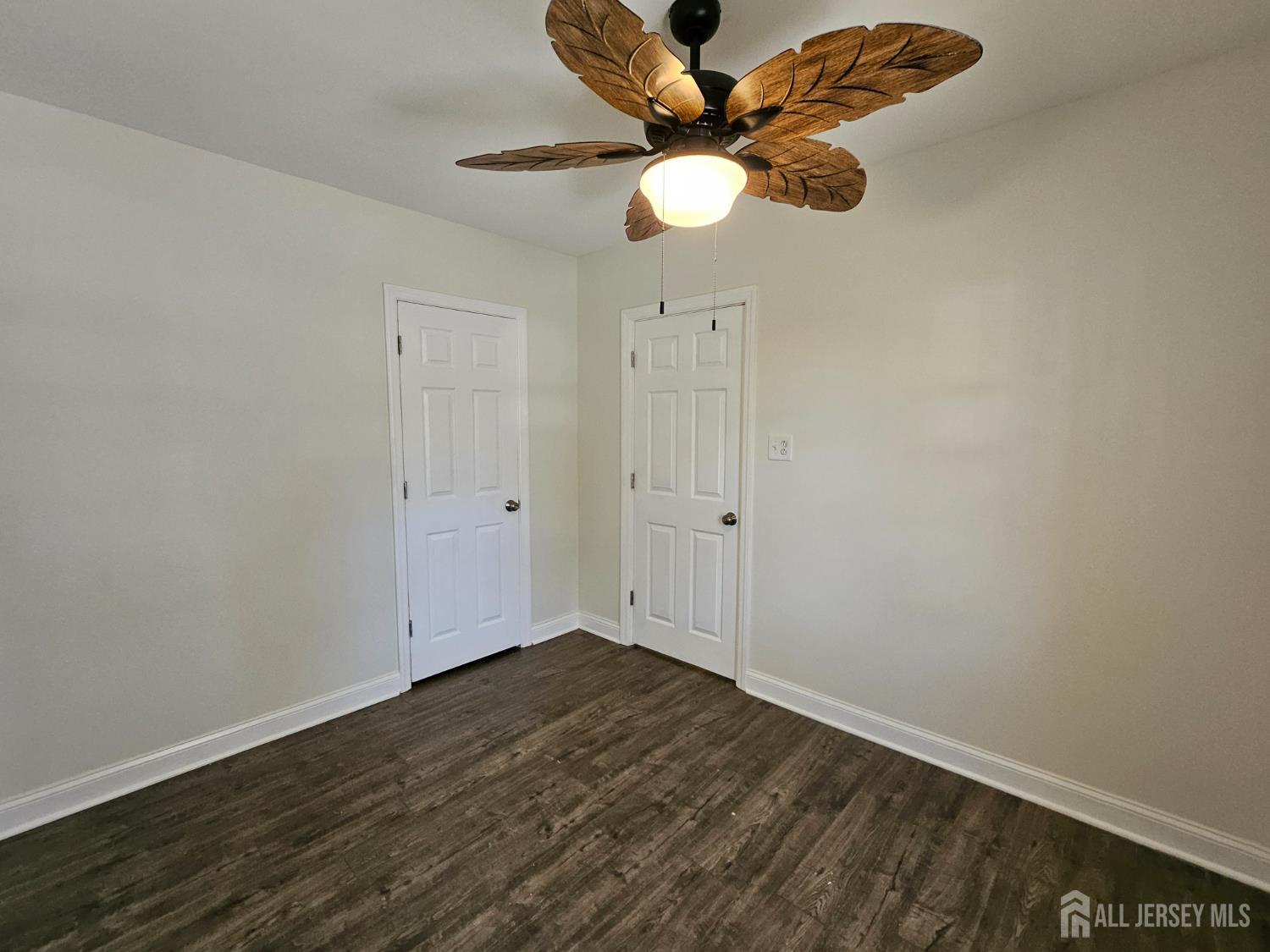 60 6th Avenue Trenton, NJ 08619 - Photo 10 of 28 wooden floor in an empty room