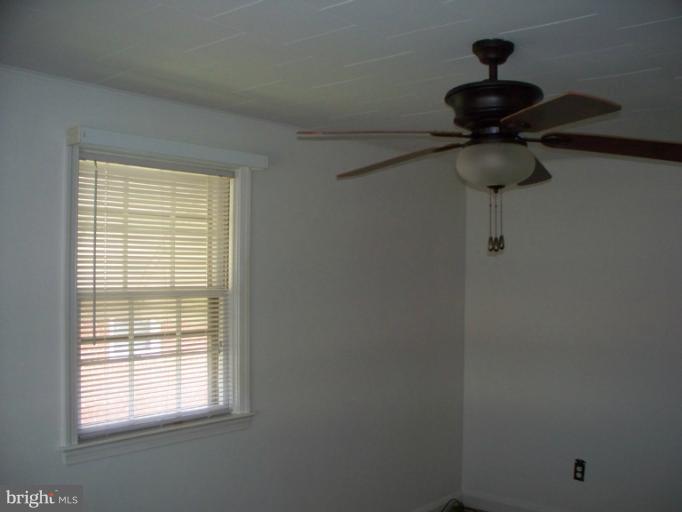 2234 Coralthorn Road Baltimore, MD 21220 - Photo 17 of 30 a view of a chandelier fan in a room