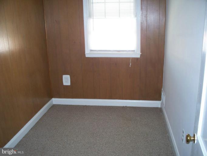 2234 Coralthorn Road Baltimore, MD 21220 - Photo 19 of 30 a view of an empty room with a window