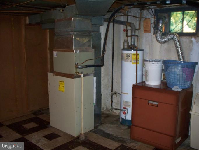 2234 Coralthorn Road Baltimore, MD 21220 - Photo 30 of 30 a room with storage and utility