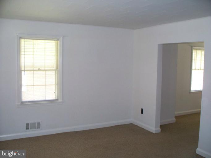2234 Coralthorn Road Baltimore, MD 21220 - Photo 9 of 30 an empty room with a window