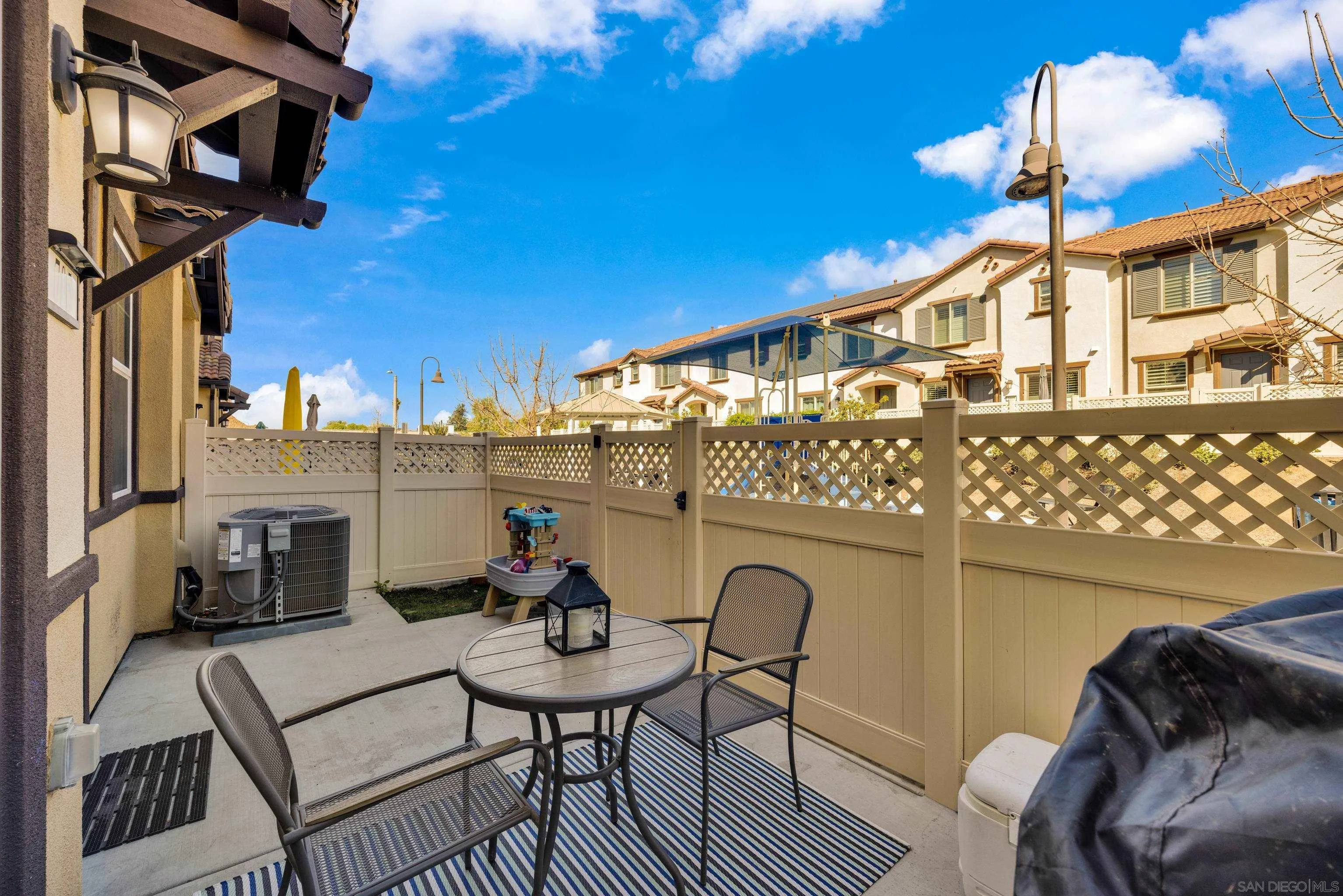 41984 Retsina Street, Unit 705 Murrieta, CA 92562 - Photo 2 of 39 a view of a balcony with furniture