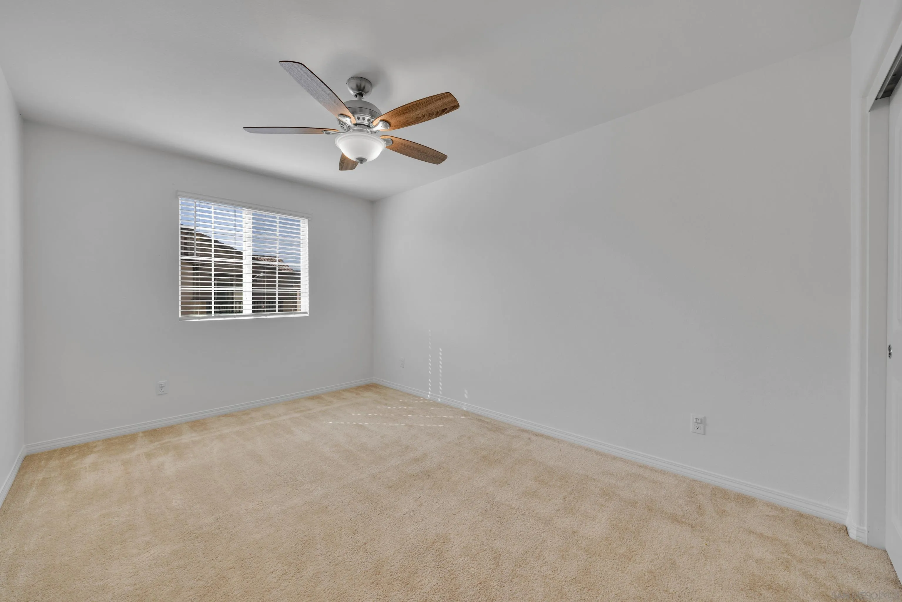 41984 Retsina Street, Unit 705 Murrieta, CA 92562 - Photo 24 of 39 a view of an empty room with a window