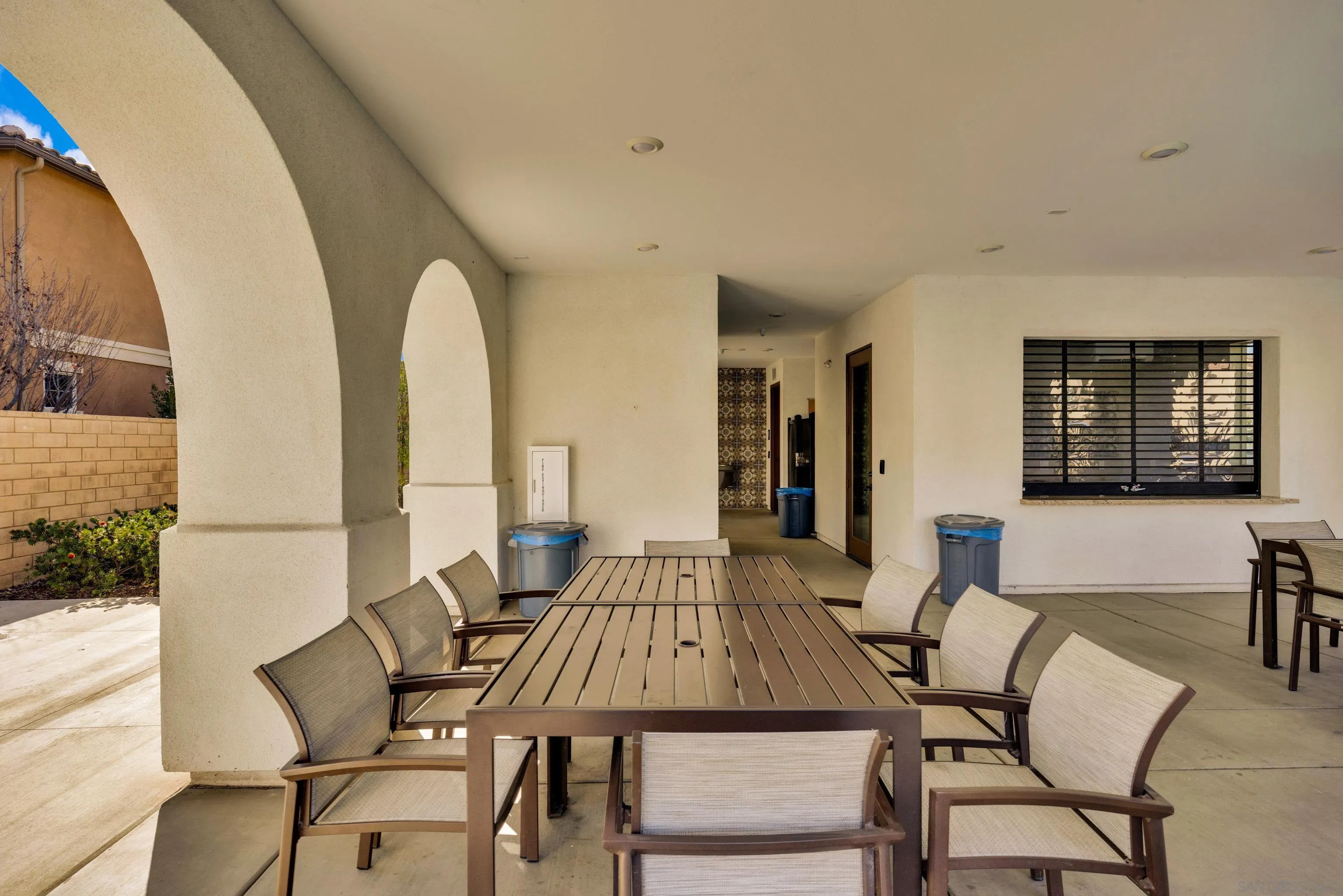 41984 Retsina Street, Unit 705 Murrieta, CA 92562 - Photo 36 of 39 a view of a dining room with furniture and wooden floor