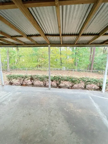 a view of a backyard of a house