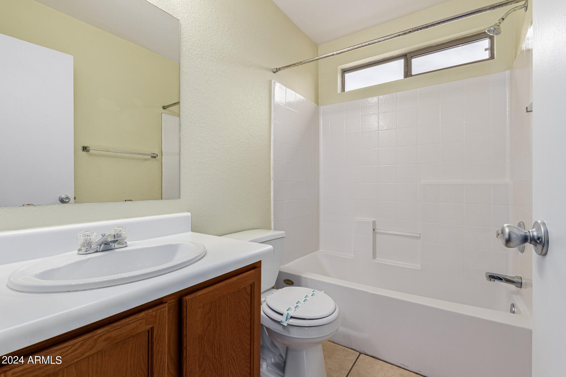 1371 South Boulder Street, Unit A Gilbert, AZ 85296 - Photo 33 of 43 a bathroom with a sink a toilet and shower