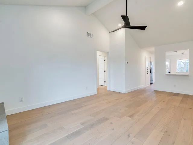 a view of an empty room and window