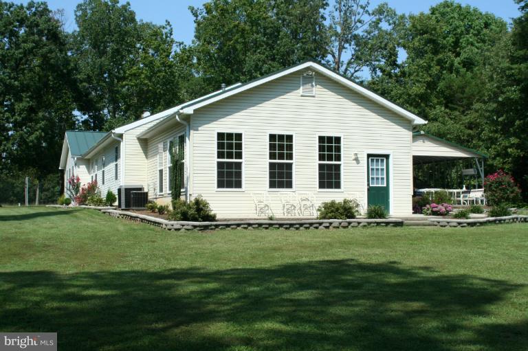 5169 Courtneys Corner Road Sumerduck, VA 22742 - Photo 7 of 29 a view of a house with a yard