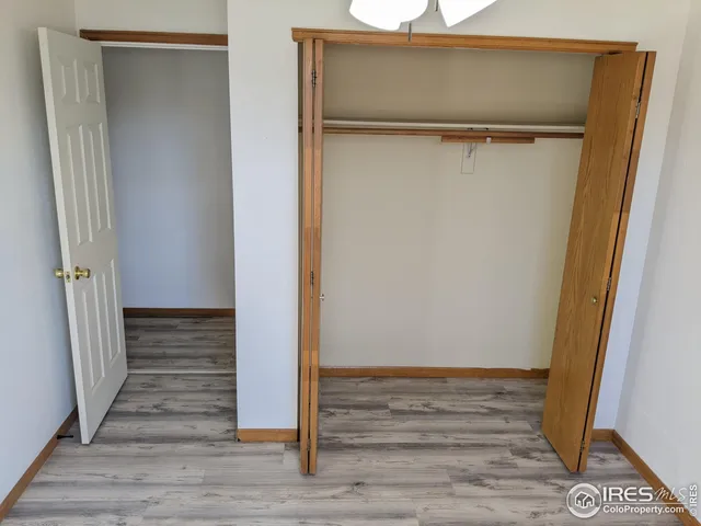 a bathroom with a shower and a toilet