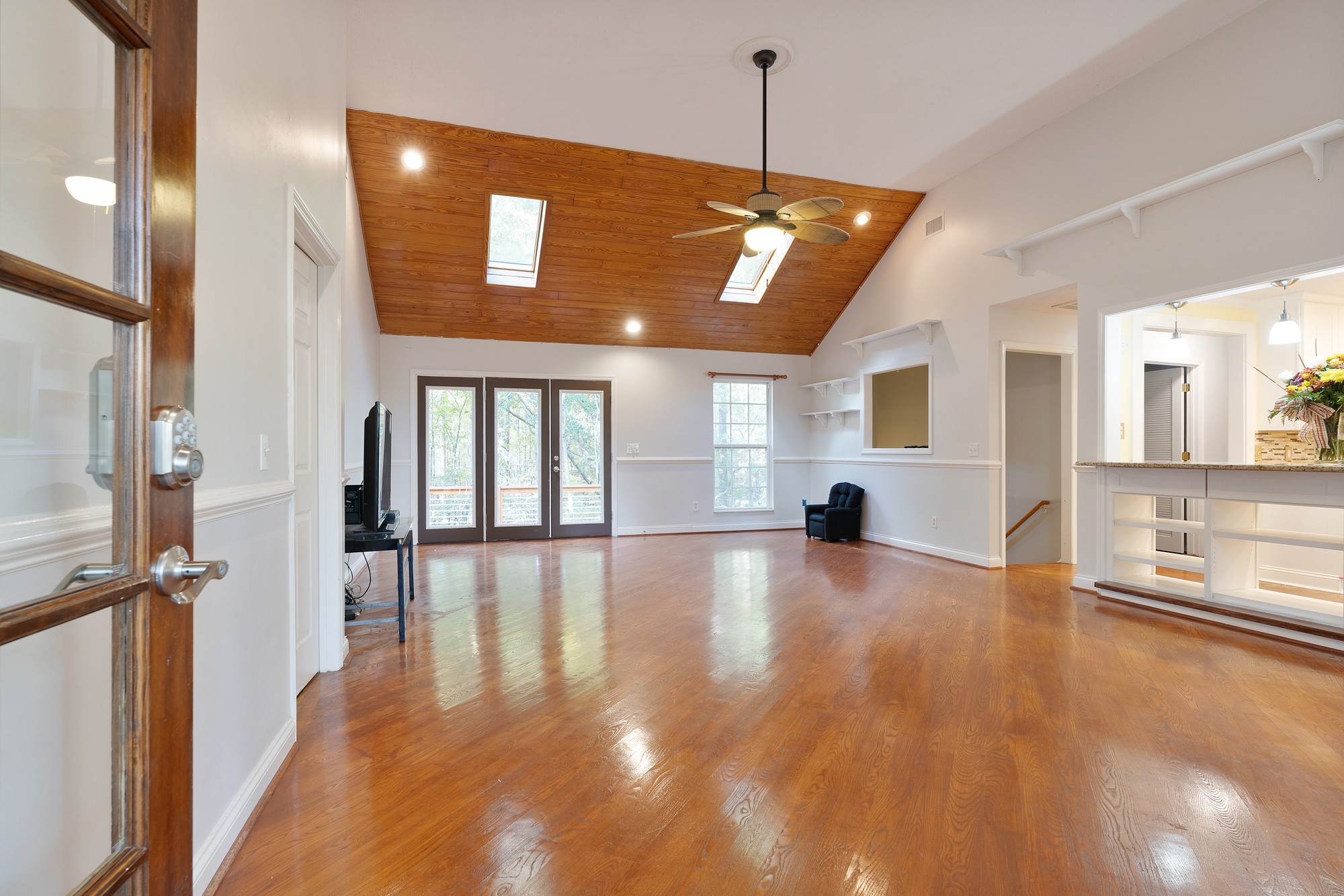 7511 Aubrey Ridge Place Fairview, TN 37062 - Photo 12 of 32 a view of an empty room with window and wooden floor