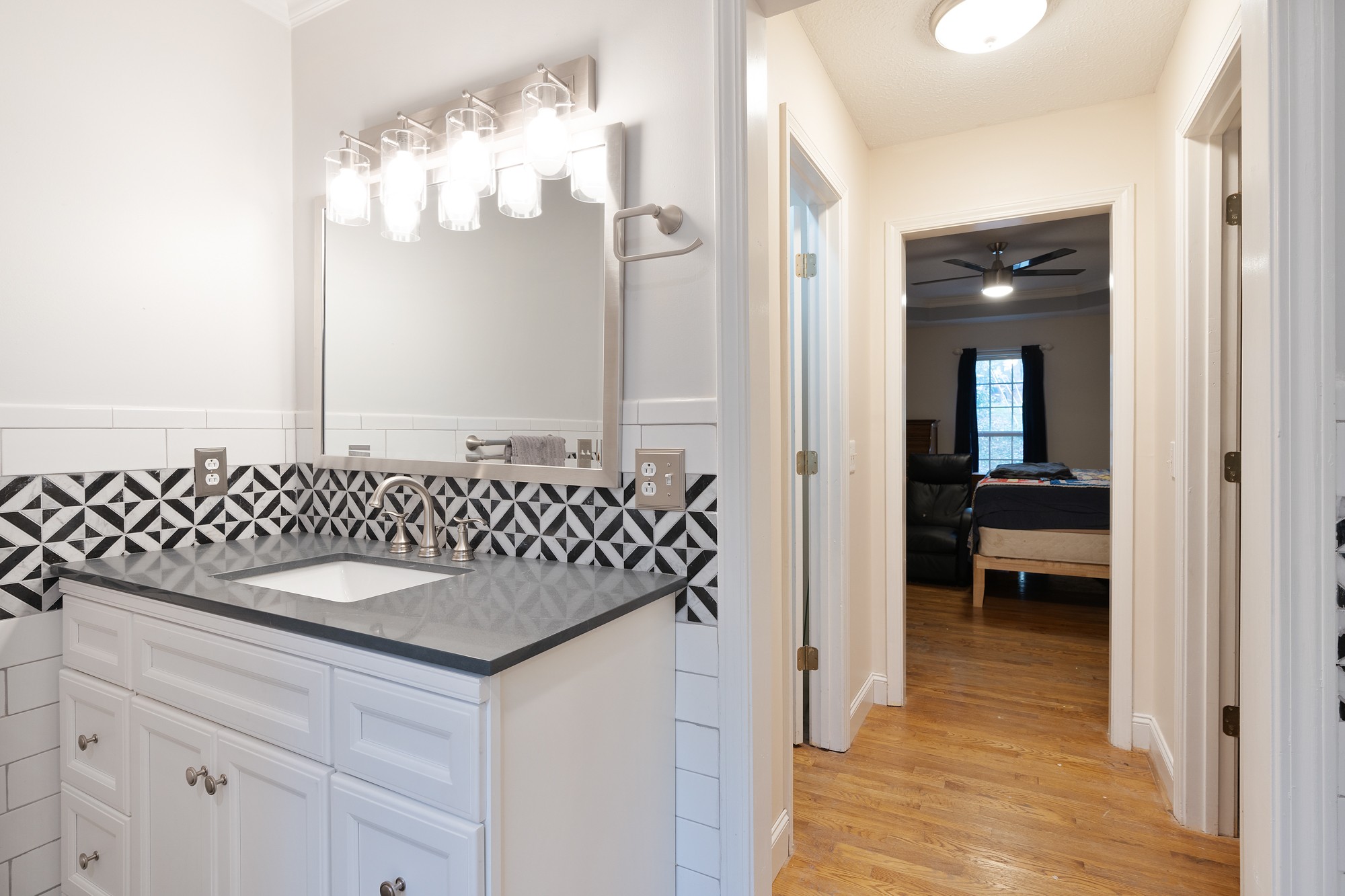 7511 Aubrey Ridge Place Fairview, TN 37062 - Photo 17 of 32 a bathroom with a sink vanity and a mirror