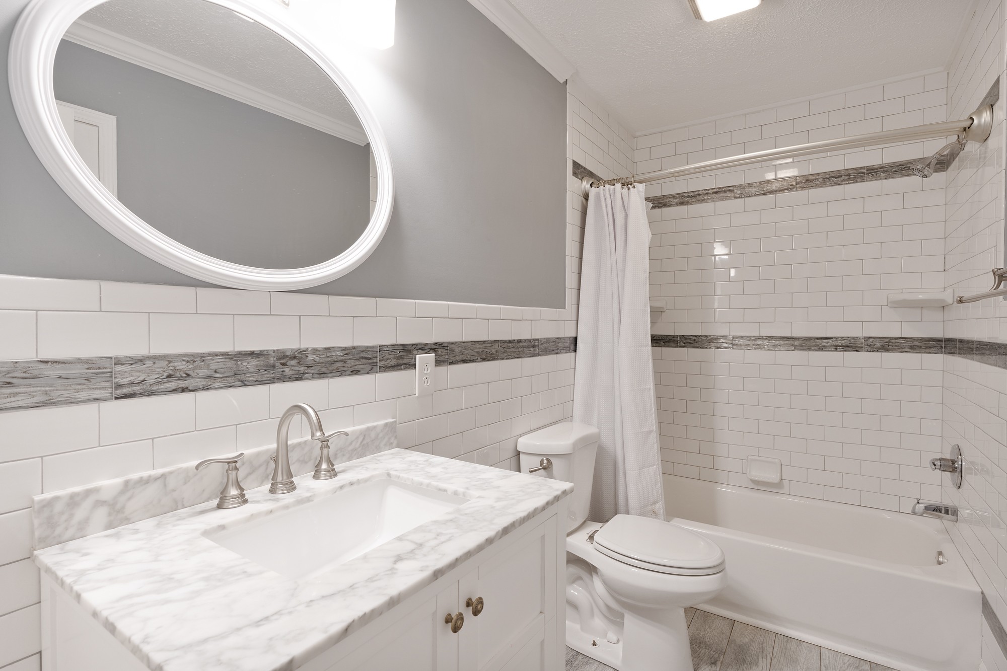 7511 Aubrey Ridge Place Fairview, TN 37062 - Photo 20 of 32 a bathroom with a sink toilet and shower