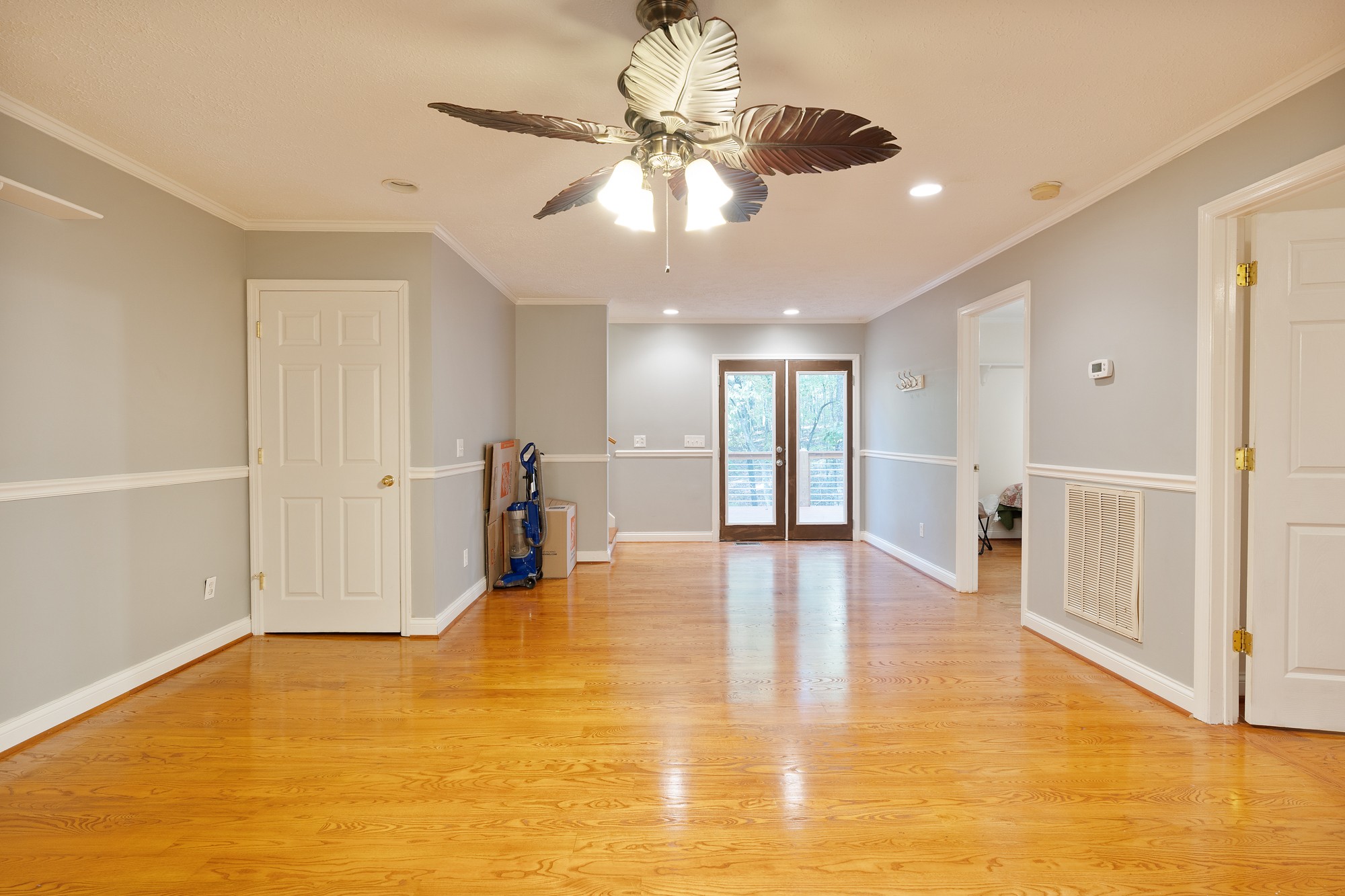 7511 Aubrey Ridge Place Fairview, TN 37062 - Photo 24 of 32 a view of an empty room with window and wooden floor